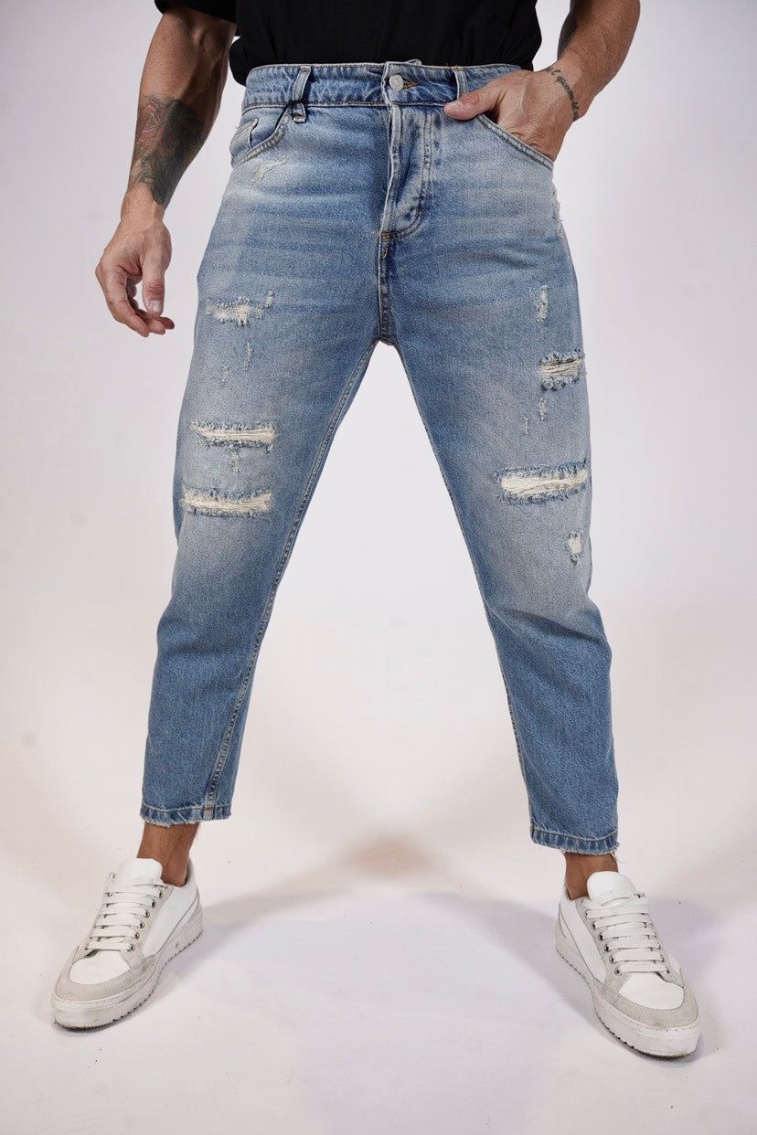 Jeans West con rotture