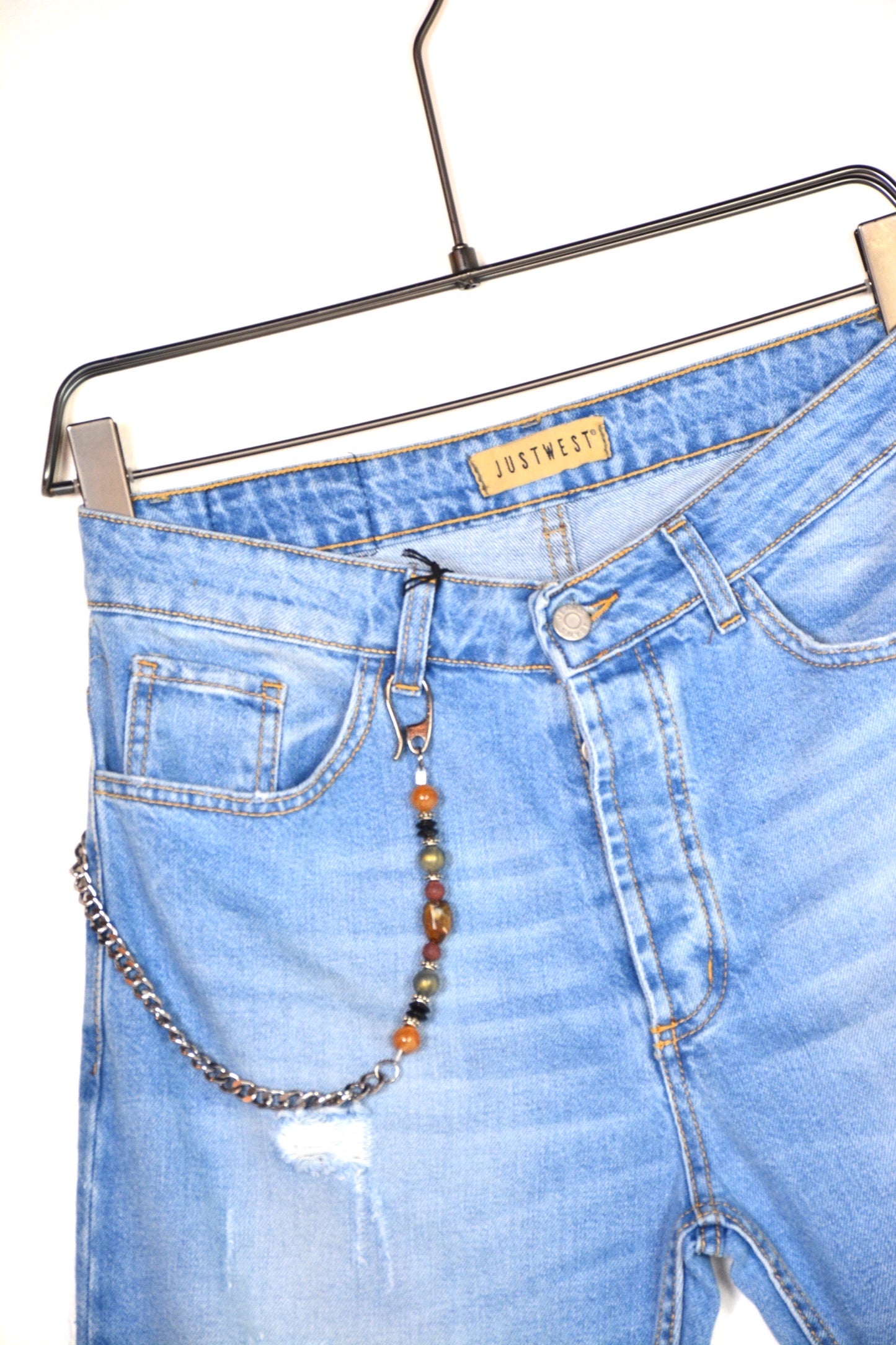 DENIM CARROT JEANS CON STRAPPI