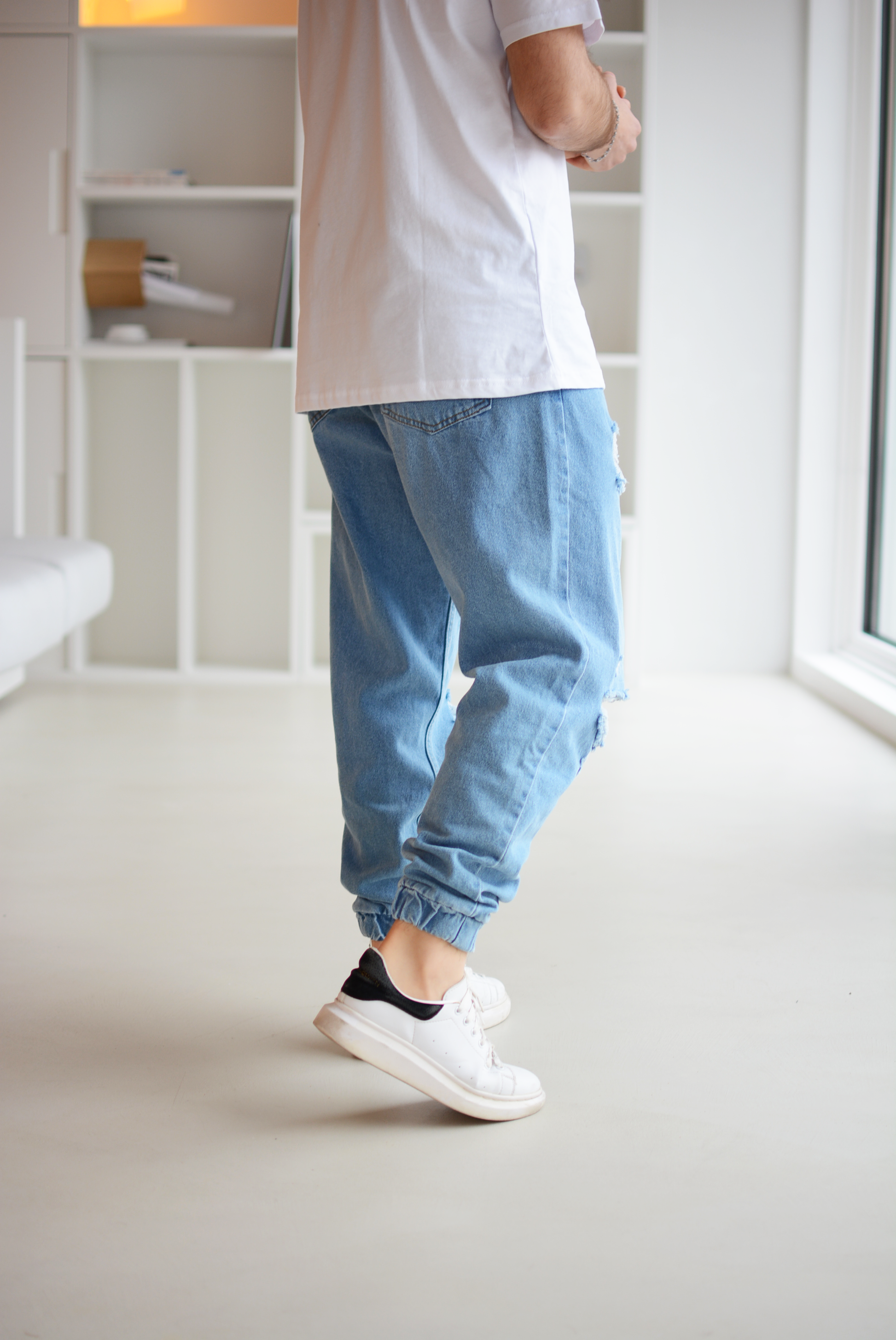 Jeans con elastico alla caviglia uomo online